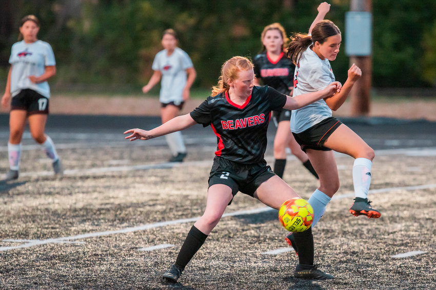 FILE PHOTO -- Tenino&rsquo;s Abby Severse (2) fights for possession before taking the ball down to score Sept. 5 against Centralia.