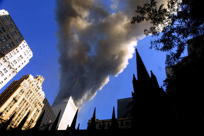 Smoke spews from a tower of the World Trade Center on Sept. 11, 2001, after two hijacked airplanes hit the twin towers in a terrorist attack on New York City. (Mario Tama/Getty Images/TNS)