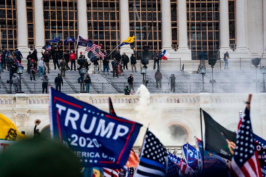 Supporters of Donald Trump clash with the U.S. Capitol police during a riot at the U.S. Capitol on Jan. 6, 2021, in Washington, D.C. (Alex Edelman/AFP/Getty Images/TNS)