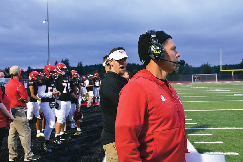 Tornados Coach Jason Ronquillo coaches the Yelm Football team from the sideline on Friday, Sept. 17, at home.