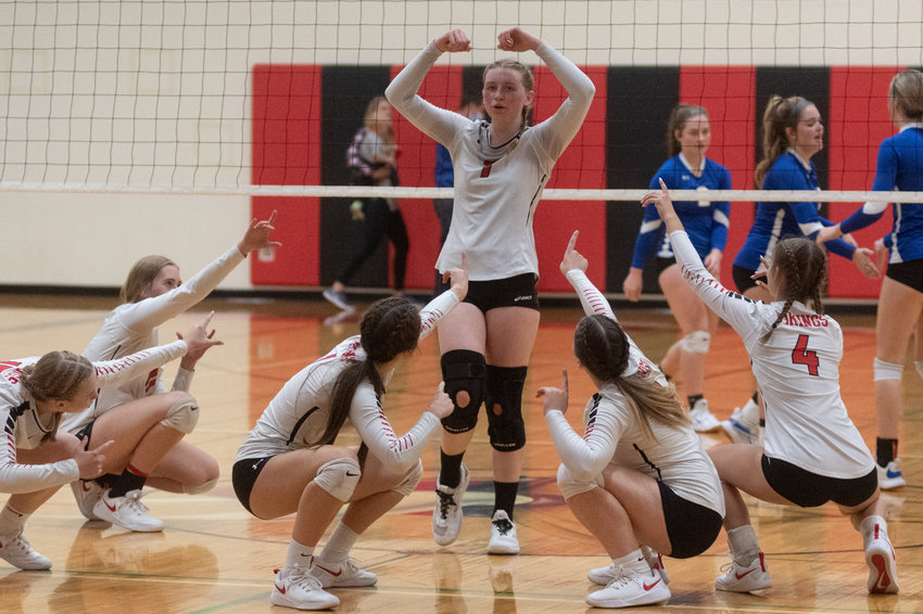 FILE PHOTO -- The Mossyrock volleyball team hypes up middle Paige Houghtelling after a kill in the Vikings five set loss to Toutle Lake earlier this season.