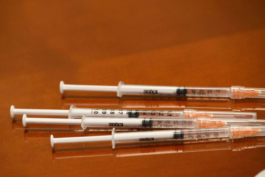 Syringes with doses of the Johnson and Johnson Janssen COVID-19 vaccine are readied at a Culver City Fire Department vaccination clinic on August 5, 2021, in California. (Patrick T. Fallon/AFP via Getty Images/TNS)