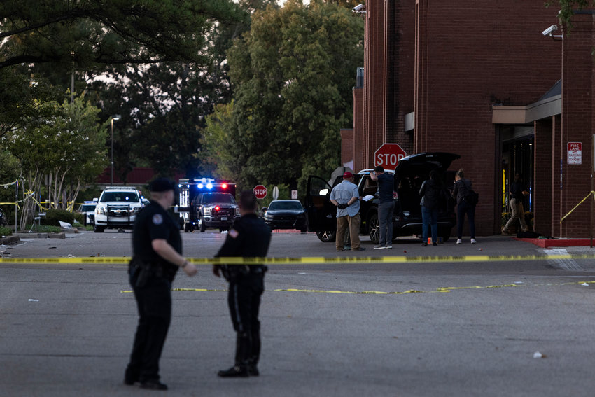 Crime scene tape outside a Kroger grocery store, where a shooting occurred on Thursday, September 23, 2021 in Collierville, Tennessee. Authorities said a gunman had apparently killed himself after opening fire inside the store, killing one person and injuring 12 others. (Brad Vest/Getty Images/TNS)