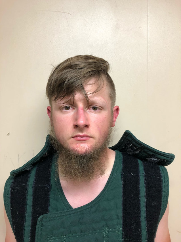In this handout provided by the Crisp County Sheriff's Office, Robert Aaron Long is pictured in a jail booking photo on March 16, 2021 in Cordele, Georgia.  (Crisp County Sheriff's Office/Getty Images/TNS)