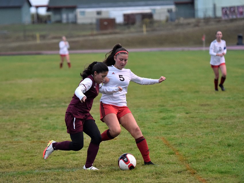 Toledo&rsquo;s Maritza Salmeron fights for possession with a Winlock defender during a match on Sept. 29, 2021.