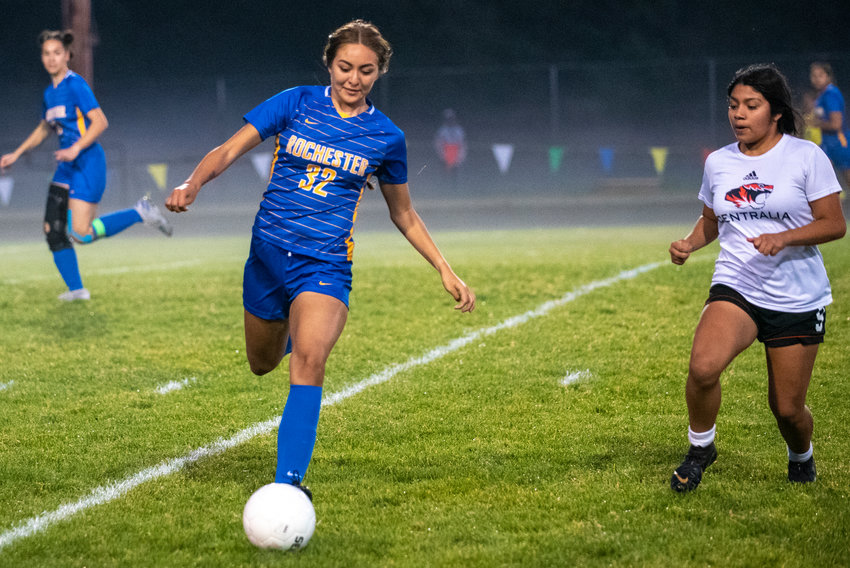 FILE PHOTO -- Rochester's Nadia Martinez (32) collects a pass from a teammate with Centralia's Alia Gomez-Ortiz (9) defending earlier this season.