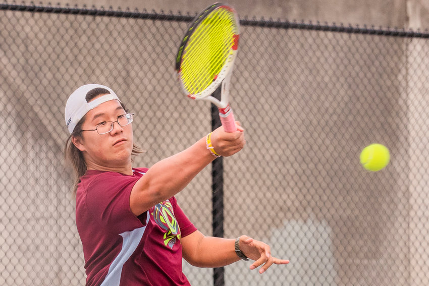 W.F. West&rsquo;s Justin Chung returns a ball during a match against Aberdeen Wednesday afternoon in Chehalis.