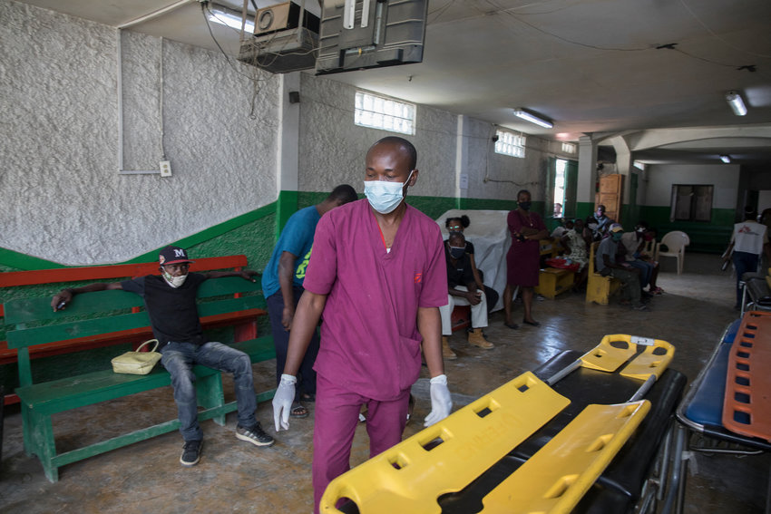 A medical worker is seen at the Martissant Hospital, in Martissant, Haiti, on May 31, 2021. (Valerie Baeriswyl/AFP/Getty Images/TNS)