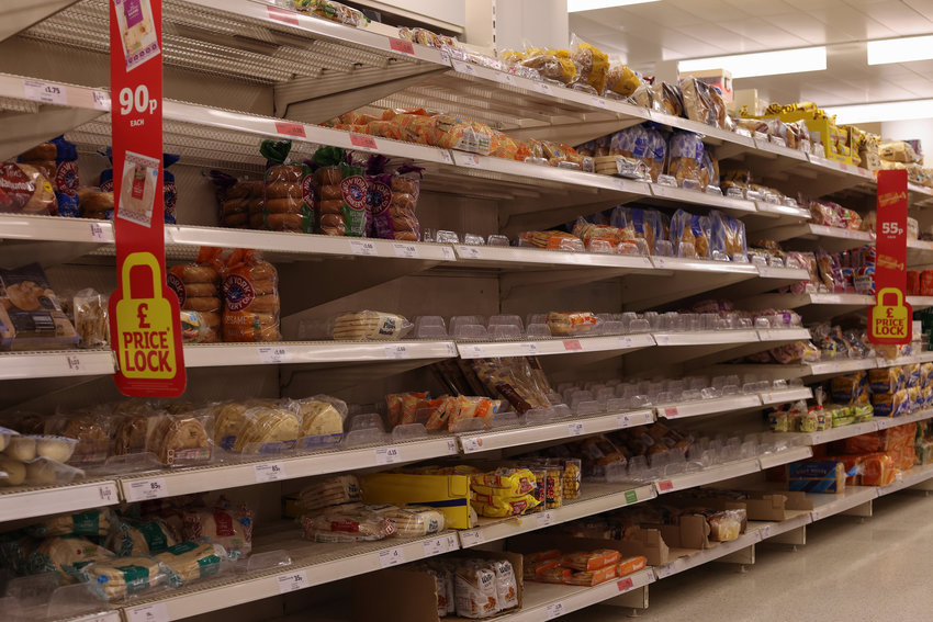 Empty shelves at a Sainsbury's supermarket on Oct. 10, 2021 in London, England. As is much of the rest of the world, the United Kingdom is facing supply chain disruptions. (Hollie Adams/Getty Images/TNS)