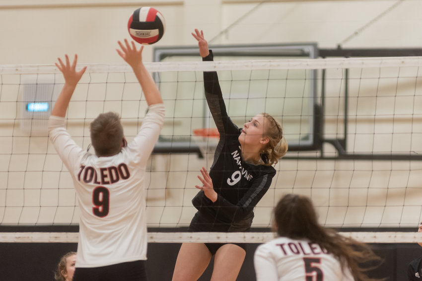 FILE PHOTO -- Napavine sophomore middle Keira O'Neill spikes down a kill against Toledo Oct. 19.