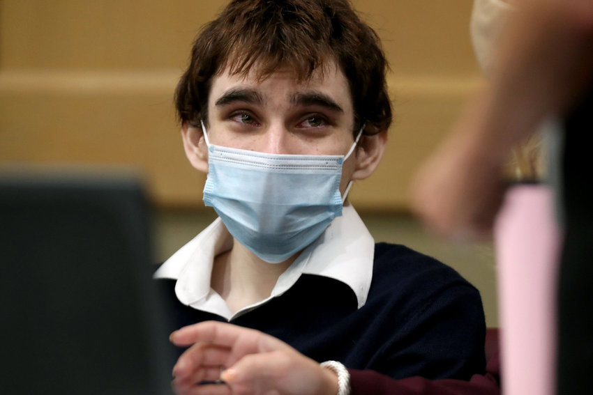 Parkland school shooter Nikolas Cruz at the defense table during jury selection in his trial at the Broward County Courthouse in Fort Lauderdale, Florida, on Oct. 6, 2021, on four criminal counts stemming from his alleged attack on a Broward jail guard in November 2018. (Amy Beth Bennett/South Florida Sun Sentinel/TNS)