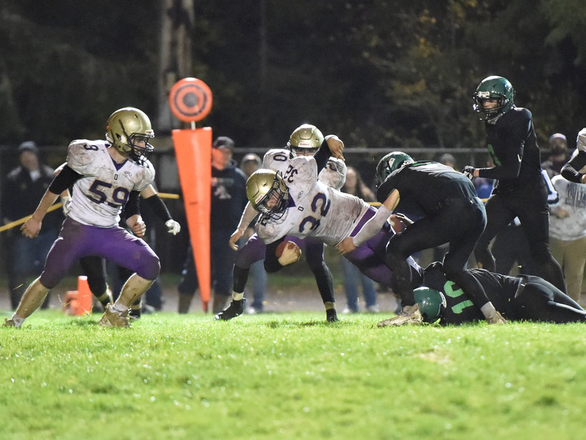 Onalaska running back Marshall Haight reaches toward the goal line late in the fourth quarter of the Loggers&rsquo; 28-14 loss against Rainier on Friday, Oct. 22, in Rainer.