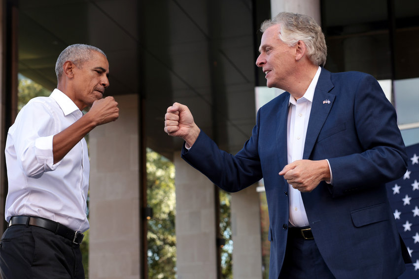Former President Barack Obama, left, campaigns with Democratic gubernatorial candidate, former Virginia Gov. Terry McAuliffe at Virginia Commonwealth University on Saturday, Oct. 23, 2021, in Richmond, Virginia. The Virginia gubernatorial election, pitting McAuliffe against Republican candidate Glenn Youngkin, is November 2. (Win McNamee/Getty Images/TNS)