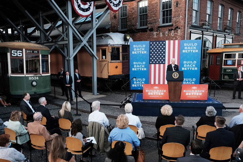 President Joe Biden speaks at an event at the Electric City Trolley Museum in Scranton on October 20, 2021 in Scranton, Pennsylvania. In an effort to appease West Virginia Senator Joe Manchin, the President has discussed a $1.75 to $1.9 trillion price tag for the spending package that's currently being negotiated. (Spencer Platt/Getty Images/TNS)