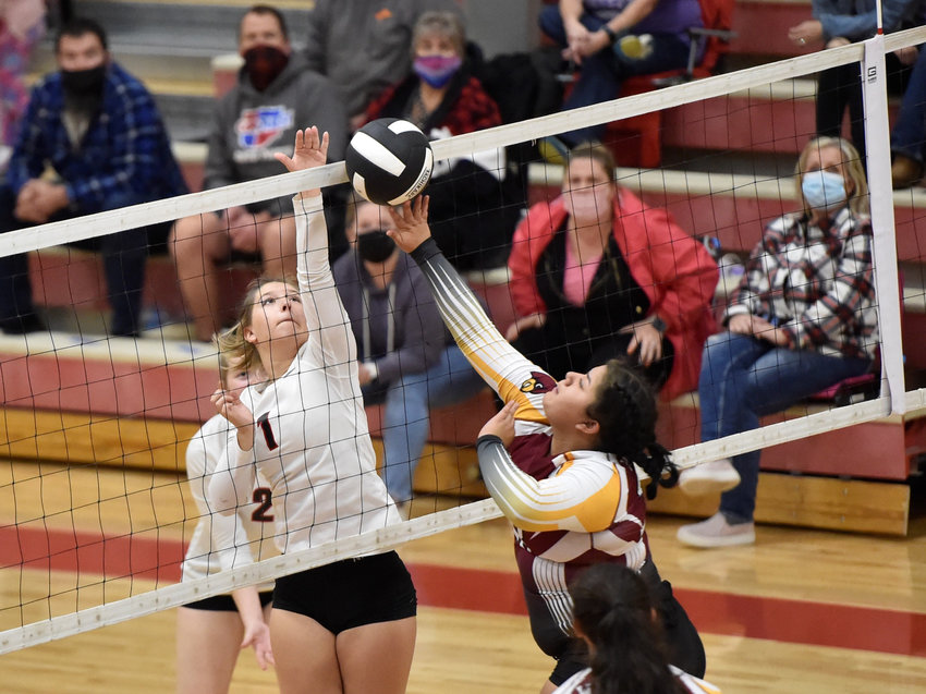 Toledo&rsquo;s Brynn Williams (1) tips the ball back to Winlock&rsquo;s Josmely Cruz on Monday, Oct. 25, in Toledo.