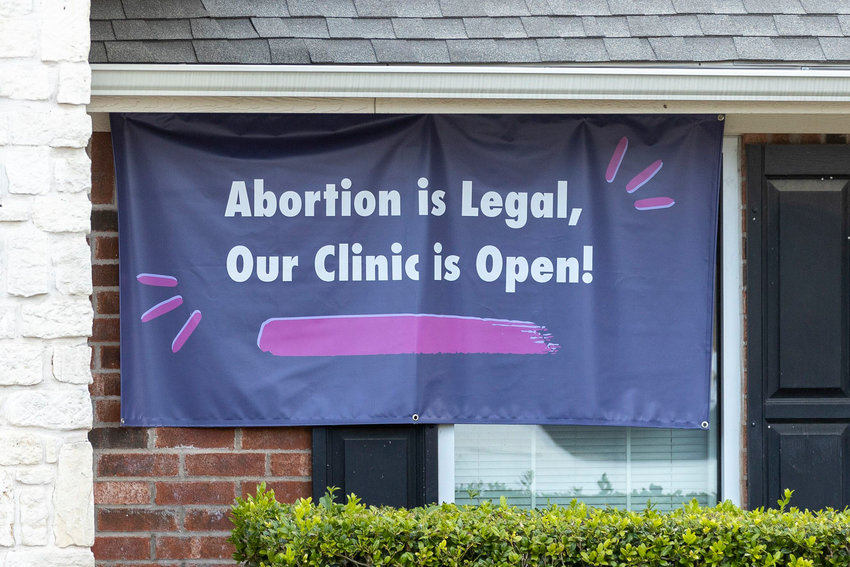 A sign at the Whole Woman's Health Clinic in Fort Worth, Texas, on Sept. 7, 2021, the day that Senate Bill 8 went into effect in Texas. (Elias Valverde II/The Dallas Morning News/TNS)