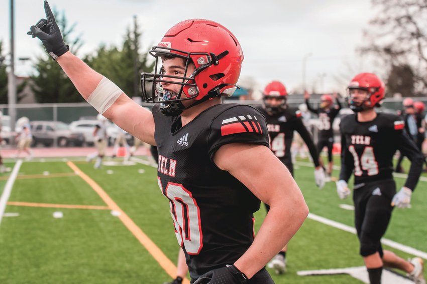 Yelm&rsquo;s William Carreto (30) holds up a finger after making an interception during a playoff game against the Mead Panthers on Saturday, Nov. 6 at Yelm High School.