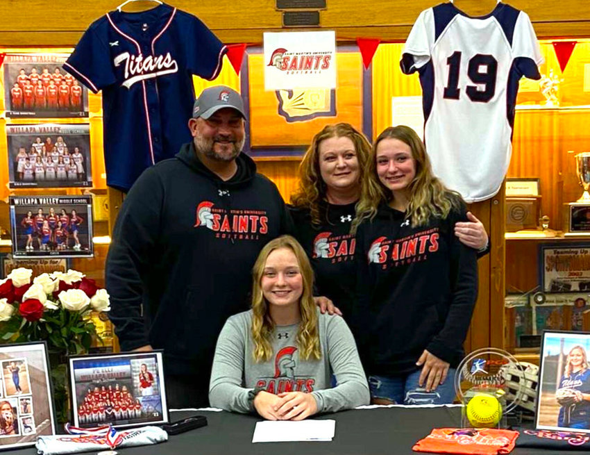 Pe Ell-Willapa Valley standout pitcher Olivia Matlock, seated, signed a National Letter of Intent on Thursday to play softball for Saint Martin&rsquo;s University. Pictured with Matlock are family members (from left), Pat Matlock (father), Torrie Matlock (mother) and Lauren Matlock (sister).