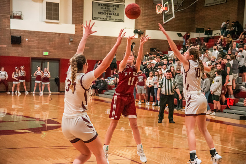 W.F. West&rsquo;s Olivia Remund (11) puts up a shot during a game against Montesano Tuesday night.