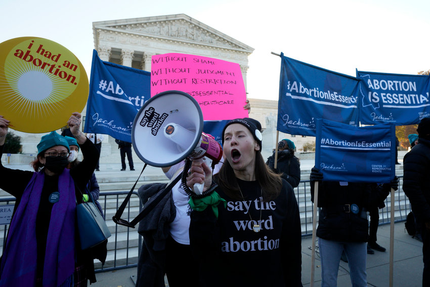 Pro-abortion rights protesters rally outside as the U.S. Supreme Court hears arguments in &quot;Dobbs v. Jackson Women's Health Organization&quot; in Washington, D.C. on Wednesday, Dec. 1, 2021. (Yuri Gripas/Abaca Press/TNS)