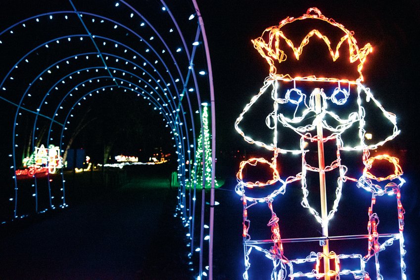 FILE PHOTO &mdash; A nutcracker stands guard illuminated by Christmas lights near the entrance of a lighted tunnel at Borst Park in Centralia last December.