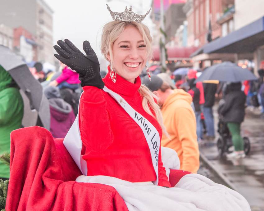 FILE PHOTO &mdash;&nbsp;Miss Lewis County Sophie Moerke smiles and waves during the Santa Parade in downtown Chehalis.