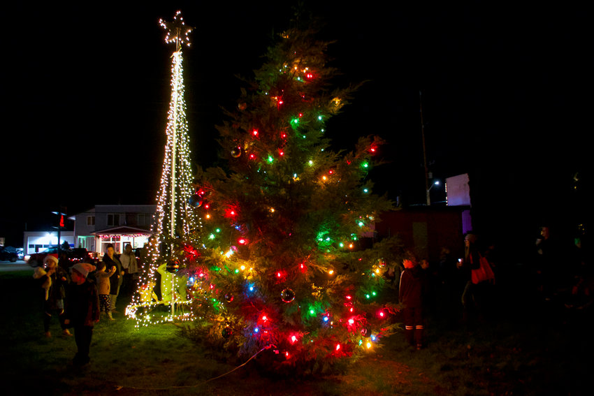 Community members enjoy the Rainier Christmas Tree Lighting event on Thursday, Dec. 2 in Holiday Park.