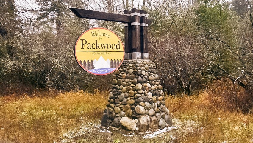 A sign reads,&ldquo;Welcome to Packwood&rdquo; along Highway 12.