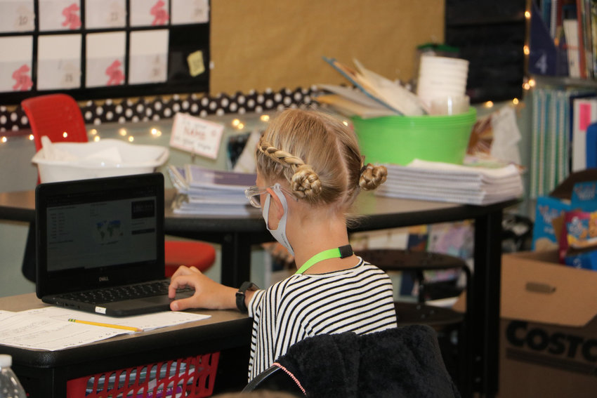A student at Battle Ground Public Schools uses a Chromebook. The district recently received a $1.4 million federal grant to help purchase more units and reimburse internet hotspot costs.