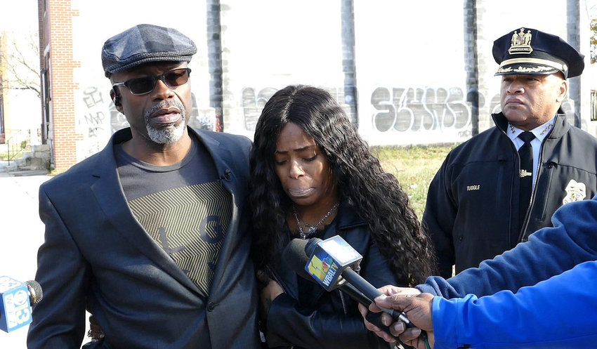 Keith Smith, along with his daughter Valeria Smith, talks with the media in the area where his wife Jacquelyn Smith was killed in Baltimore, in December 2018. A Baltimore jury found Keith Smith guilty Thursday, Dec. 9, 2021 of first-degree murder for stabbing his wife to death three years ago. (Kevin Richardson/The Baltimore Sun/TNS)