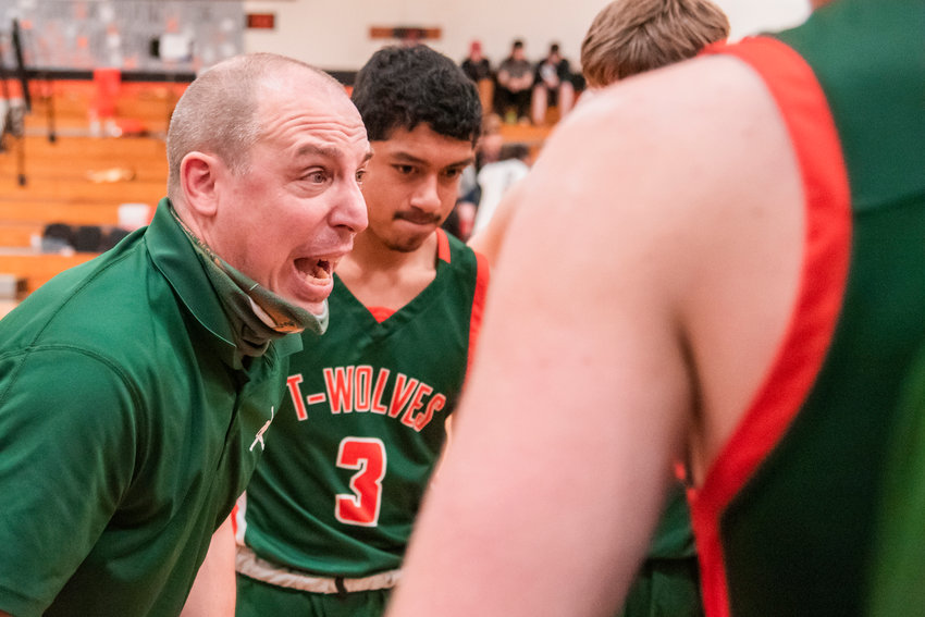 Timberwolves Head Coach Chad Cramer yells to athletes during a game in Napavine Tuesday night.