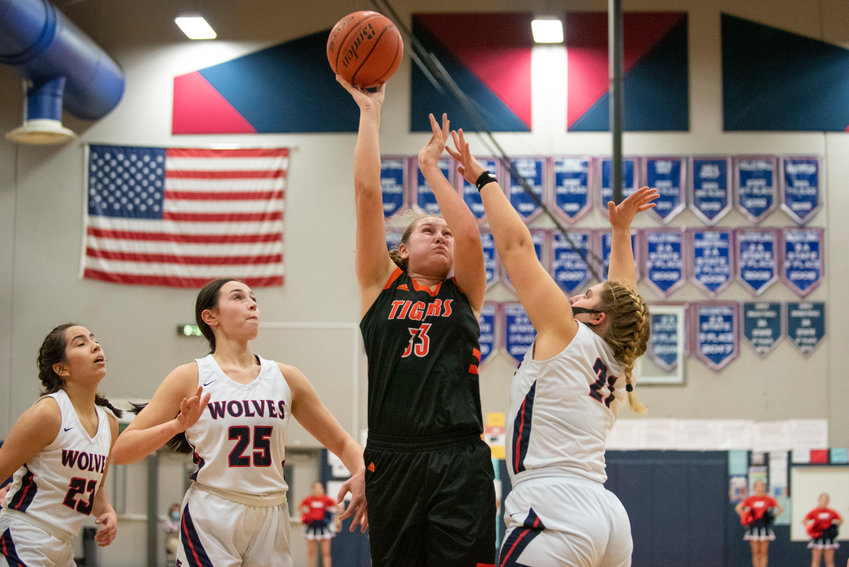 Centralia's Emily Wilkerson (33) puts up a shot in the paint during a road victory over Black Hills on Friday.