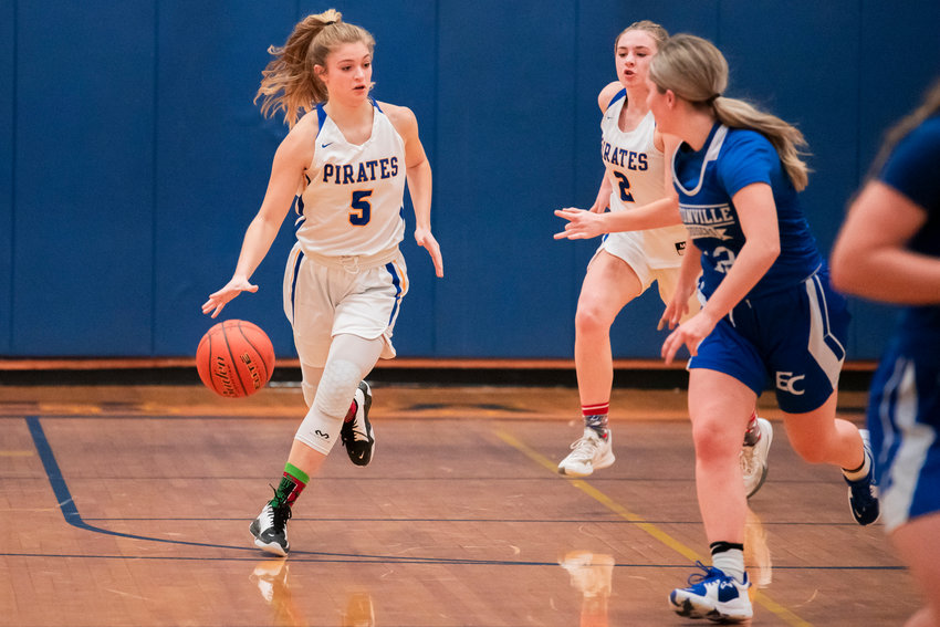 Adna&rsquo;s Kaylin Todd (5) dribbles the ball down the court during a game against Eatonville Friday night.