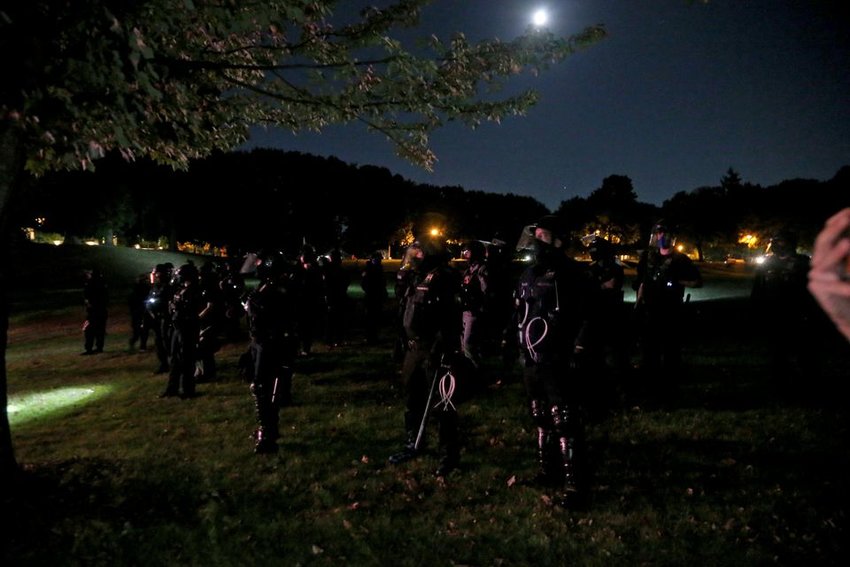 FILE &mdash;&nbsp;Portland police showed up Sept. 28, 2020, at Kenton Park, where protesters gathered before marching to the Portland Police Association office.