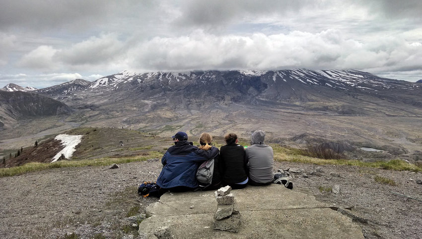 Hikers take in a picturesque scene along a trail in the Mount St. Helens blast zone in this file photo.