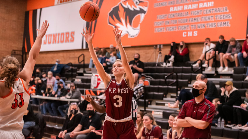 W.F. West&rsquo;s Lexi Roberts (3) shoots from deep during a game against the Tigers on Ron Brown Court in Centralia Tuesday night.