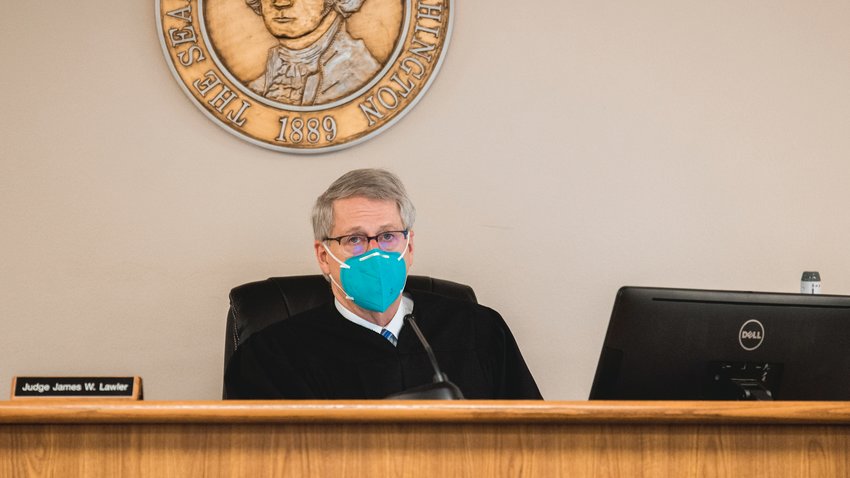 Judge James W. Lawler wears a mask as he presides over Lewis County Superior Court in January 2021.