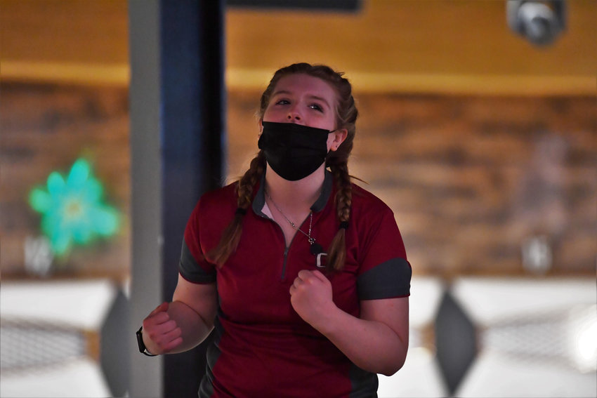 W.F. West&rsquo;s Piper Chalmers celebrates after bowling a strike in the final frame of the Baker Games at the 2A District 4 girls bowling tournament at Triangle Lanes in Longview on Jan. 28.