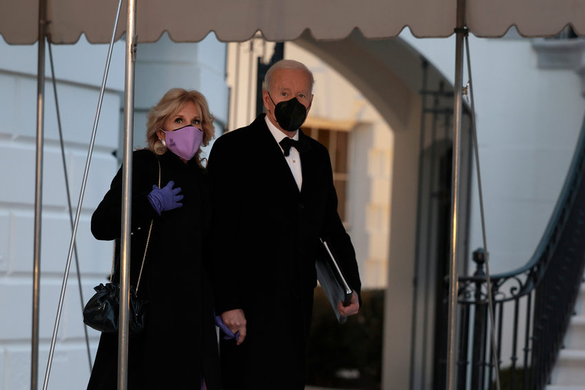 President Joe Biden and First Lady Dr. Jill Biden walk out of the White House to board Marine One on Jan 30, 2022, in Washington, DC. (Anna Moneymaker/Getty Images/TNS)