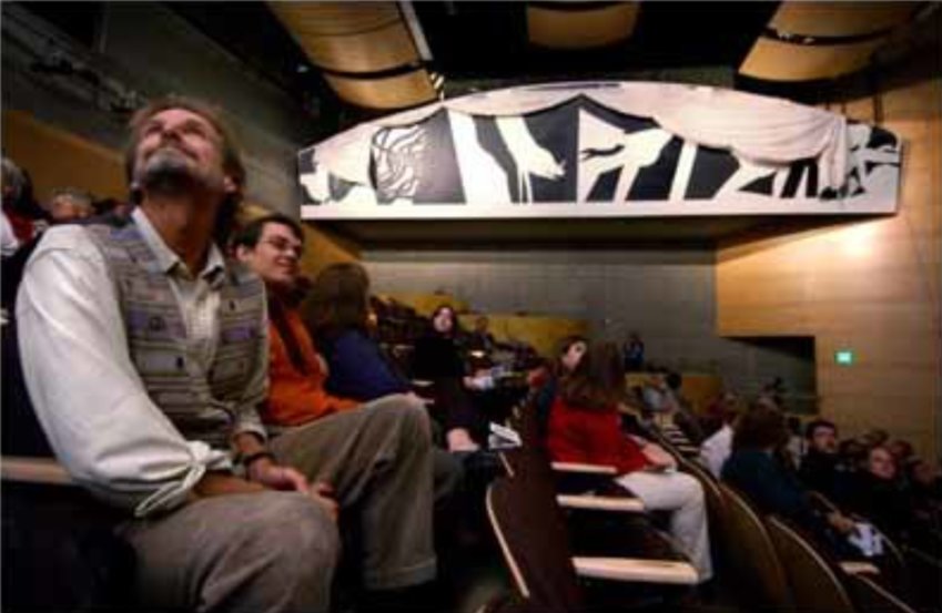 Project architect Andy Rovelstad, left, and Joshua McNichols, both of whom worked for the architect responsible for designing Centralia College's Corbet Theater, watch as the curtains rise to reveal the &quot;Twelve Labors of Hercules&quot; in 2003.