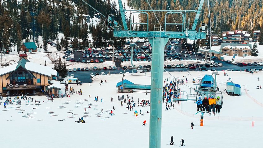 Visitors line up to ride The Great White chairlift at the White Pass Ski Resort on last month.