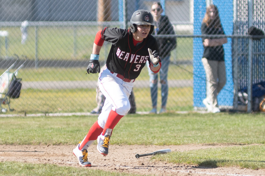 Tenino's Easton Snider runs down the first base line against Rochester in the Scatter Creek Derby March 12.