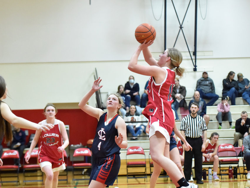 Winlock's Addison Hall shoots a jumper over Wahkiakum's Megan Leitz during Lower Columbia College's senior all-star game on Tuesday, March 16.