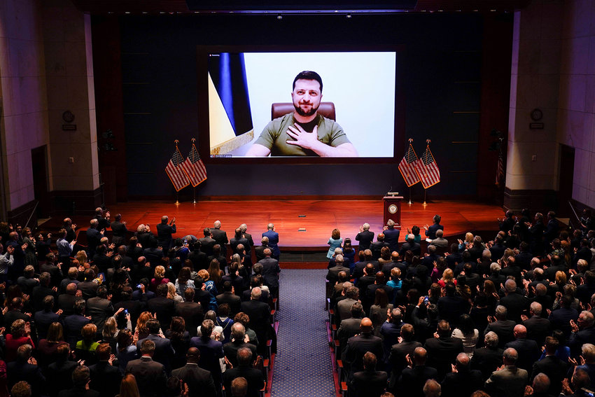 Ukrainian President Volodymyr Zelensky virtually addresses the US Congress on March 16, 2022, at the US Capitol Visitor Center Congressional Auditorium, in Washington, DC. (J. Scott Applewhite/Pool/AFP/Getty Images/TNS)