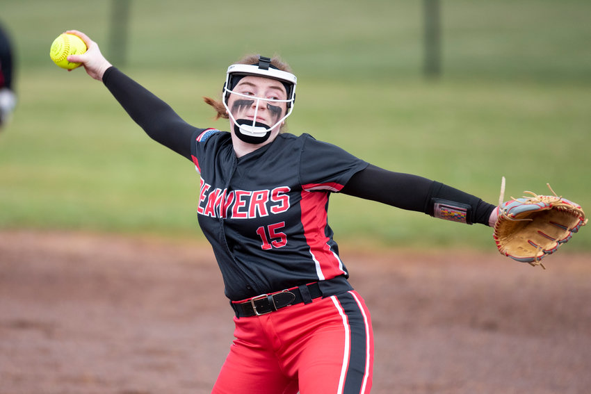Tenino pitcher Emily Baxter winds up to deliver a pitch to Toledo during a non-league home game March 16.