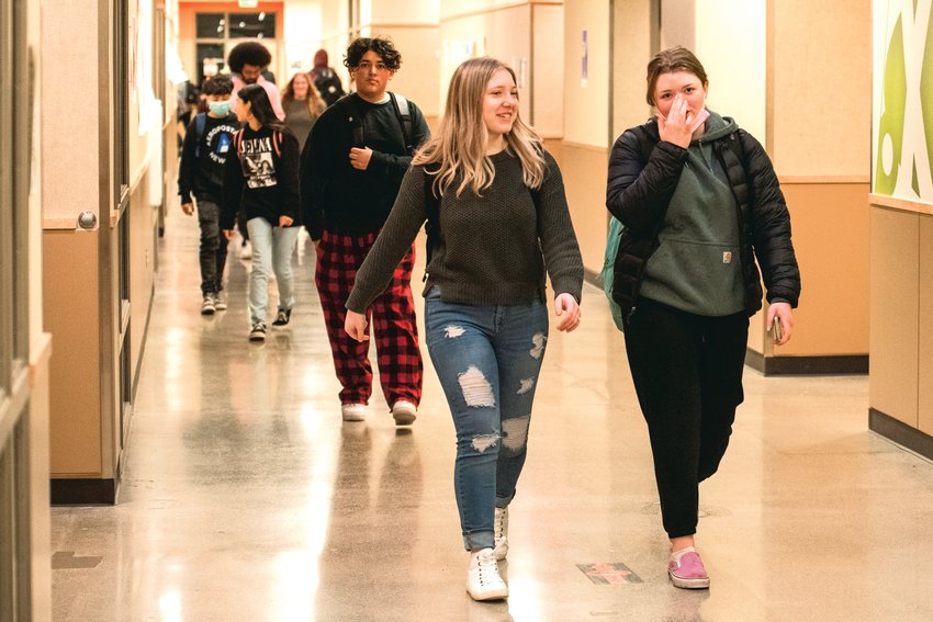 FILE PHOTO &mdash; Students mingle as they walk down halls at Centralia High School in March 2022.