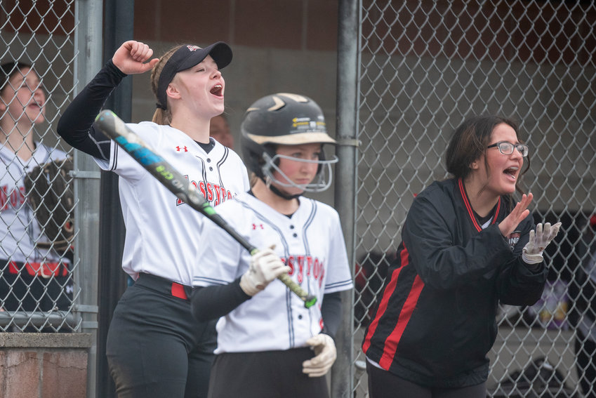 Mossyrock players cheer after a Vikings' basehit against Rainier at home on March 18.