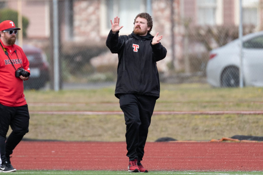 Tenino coach Kevin Schultz organizes his team against Centralia March 19 at Tiger Stadium.