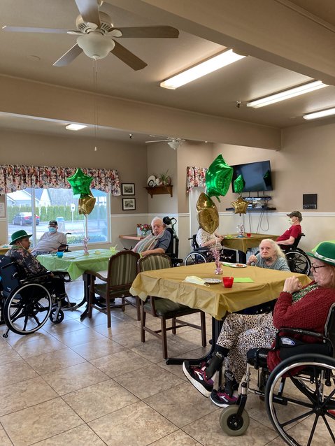 The seniors at Woodland Care Center enjoy their St. Patrick&rsquo;s Day Celebration on March 17, complete with green decorations and food.
