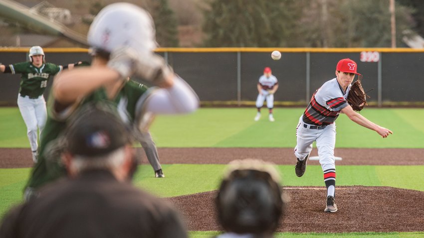 Yelm&rsquo;s Austin Richardson (23) throws a pitch during a game against the Blazers on Tuesday, March 15.